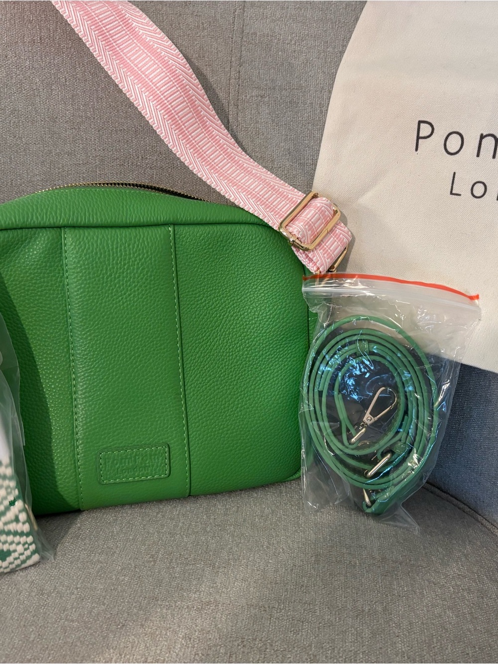 Green Pebbled Leather Crossbody Bag with Pink Strap